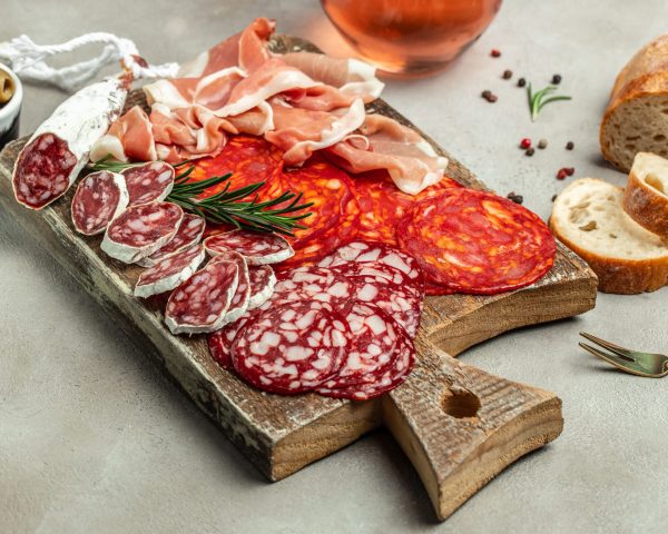different-italian-ham-and-salami-on-a-wooden-board-2023-08-17-16-17-08-utc-2